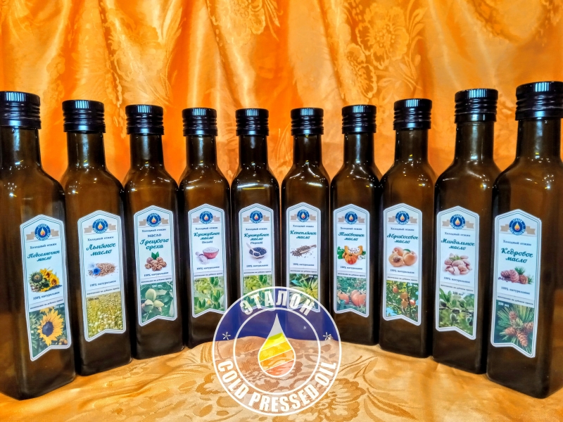 Сыродавленное масло на дубовом прессе